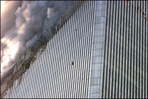 A person falls from the north tower of the World Trade Center in New York, in this Sept. 11, 2001. file photo.