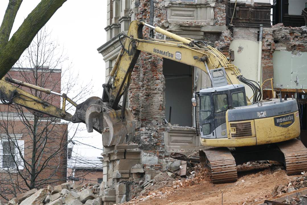 workers-remove-cornerstone