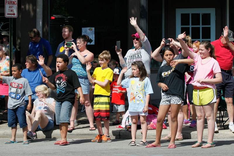 CTY-sylparade27pChildren-along-the-route-waved-flags-cheered-and-s