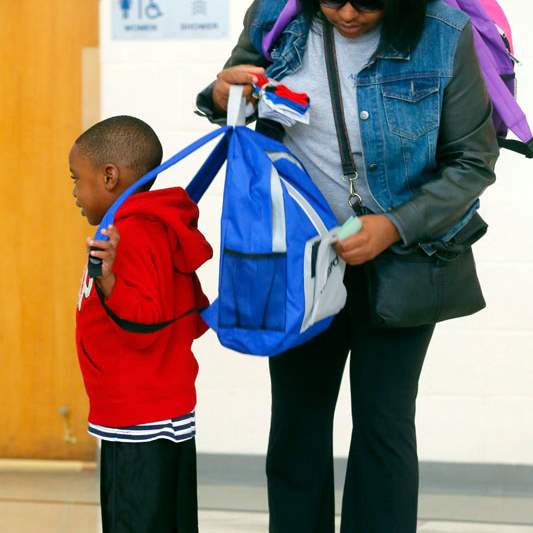 CTY-backpacks14pLaticia-Holmes-right-helps-p
