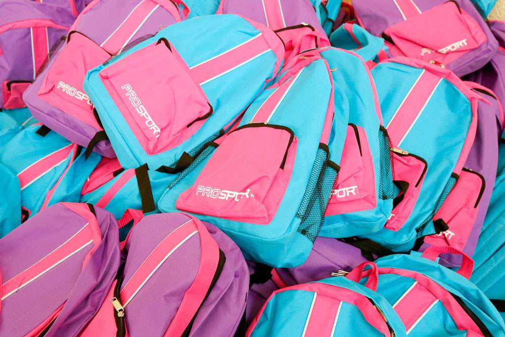 CTY-backpacks14pA-mountain-of-girl-s-backpacks-to-be-distributed