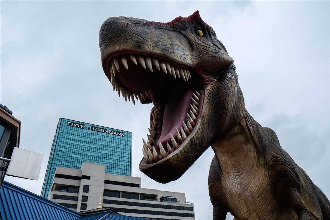 CTY-dinosaur21pA-tyrannosaurs-rex-appears-ready-to-eat-Fifth-Third-Bank