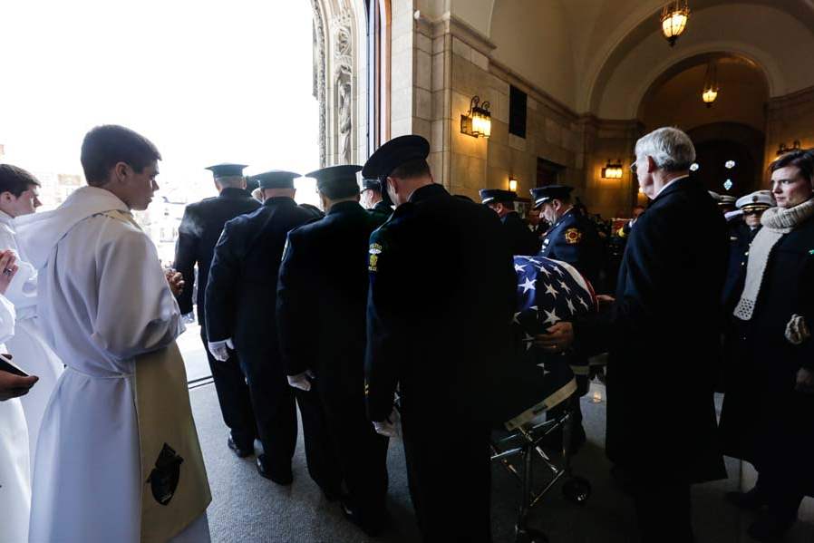 CTY-collinsfuneral-casket-leaves-inside