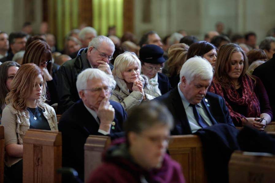 CTY-collinsfuneral-praying