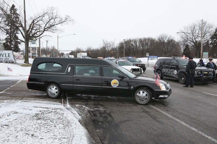 Collinsfuneral-hearse-leaves-coyle