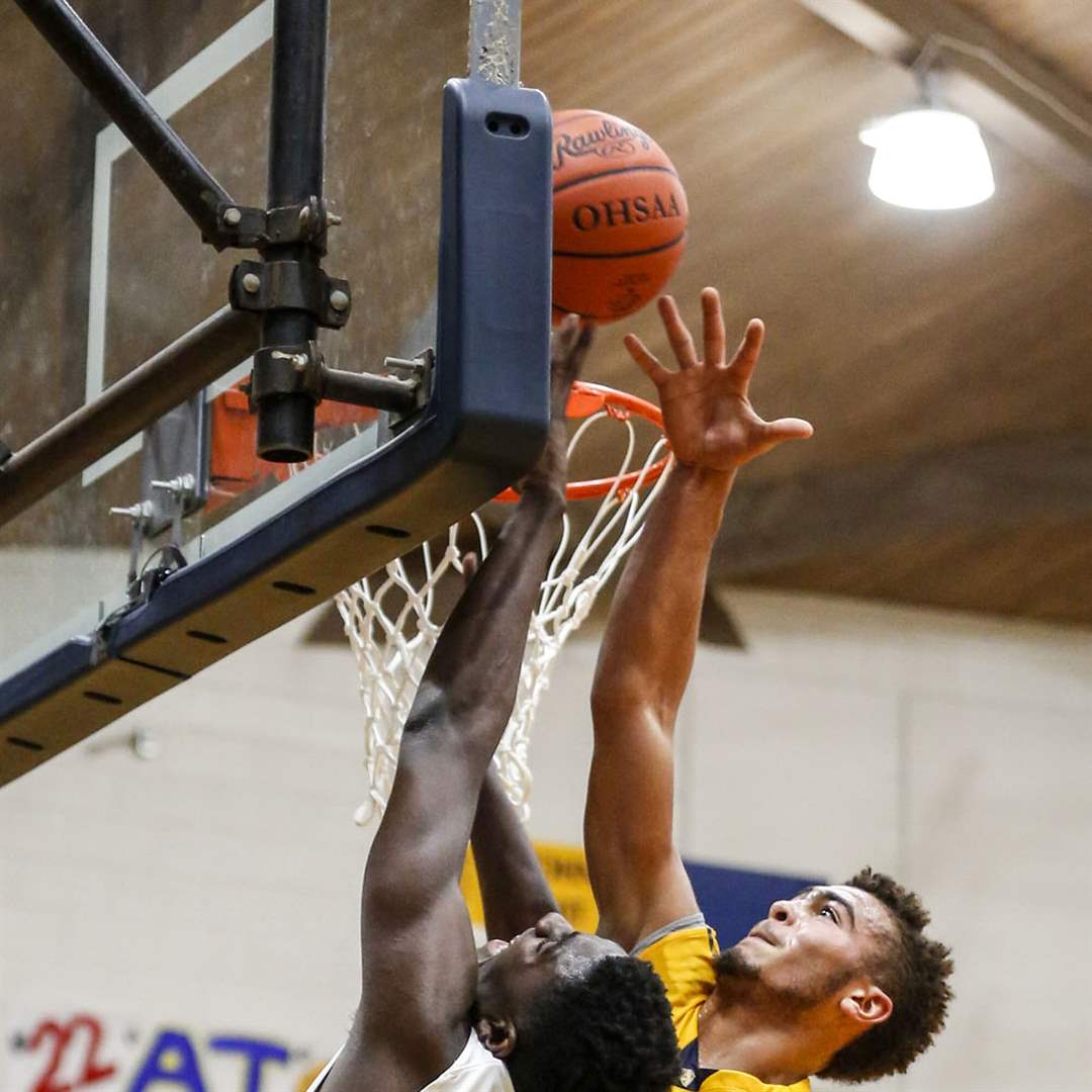 SPT-SJwhitmer12pSt-John-s-Jesuit-player-Vin