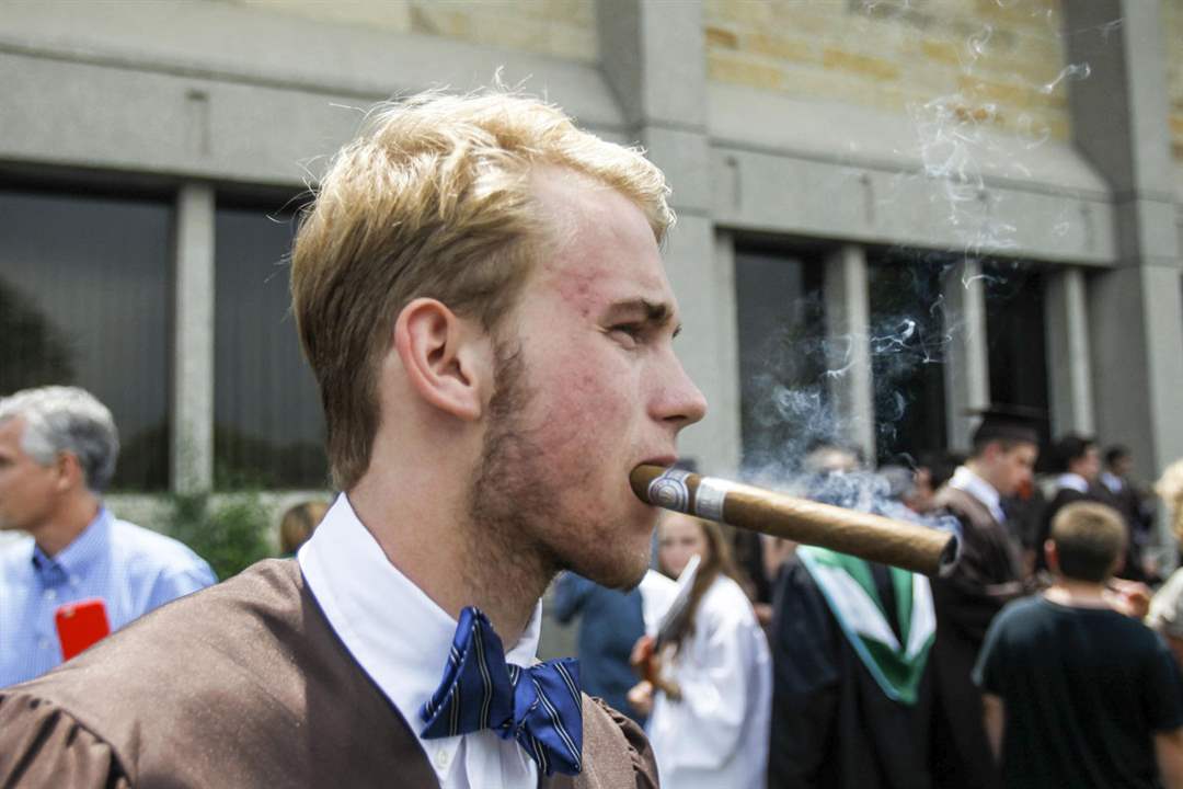 syl-graduationGunner-Kronmann-smoke