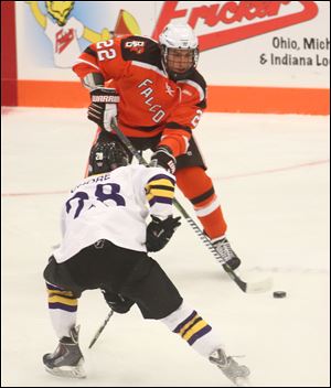 Bowling Green State University's Lukas Craggs, shown earlier this season against Wilfrid Laurier, earned national honors from NCAA hockey this week. He and the Falcons play an important series at Northern Michigan this weekend.