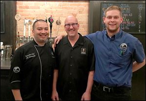 From left, chef J.R. Hernandez, owner Mike Mullins, and bartender Joel Rider are offering an upscale menu and beer at Sugar Ridge Brewery in downtown Bowling Green.