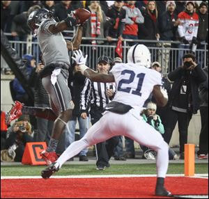 Johnnie Dixon, who led the team in touchdown receptions last season, will return to Ohio State.