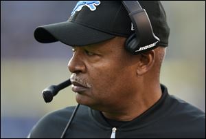 Detroit Lions head coach Jim Caldwell walks on the sideline in the second half Sunday's loss to the Baltimore Ravens. 