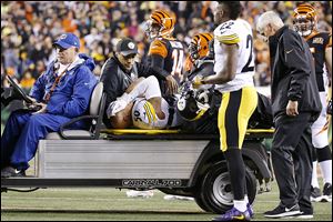 Pittsburgh Steelers linebacker Ryan Shazier is carted off the field after an injury in the first half of Monday's game against the Cincinnati Bengals in Cincinnati.