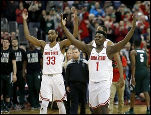 Ohio State forward Keita Bates-Diop, left, and forward Jae'Sean Tate celebrate after defeating Michigan State earlier this season. The Buckeyes are a No. 5 seed in the NCAA tournament.