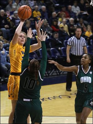 Toledo's Michaela Rasmussen shoots over Ohio's Dominique Doseck during Wednesday's game at Savage Arena in Toledo.