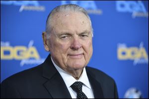 Keith Jackson, the down-home voice of college football during more than five decades as a broadcaster, died on Friday, Jan. 12. He was 89. 