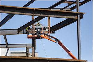 Tim Hartman, an Ironworker from Local 55, works on the third floor of the patient rooms being added to the Mercy Health Cancer Center. 