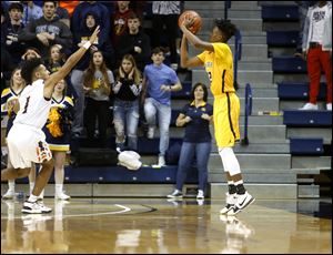 Whitmer's Edward Colbert drains his game-winning 3-pointer against Southview.