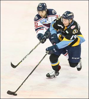 Toledo Walleye defender Ryan Obuchowski (14) scored his fifth goal of the season in the 4-2 win over Quad City on Saturday.