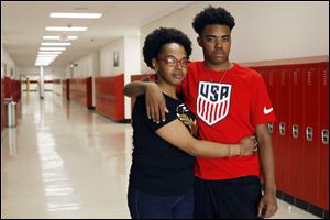 April Taylor had her son Marshaun, 15, recently transferred to Rogers High School for a fresh start.