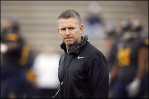 Toledo head coach Jason Candle watches the action during the University of Toledo football spring scrimmage Friday, April 13, 2018, at the Glass Bowl. 