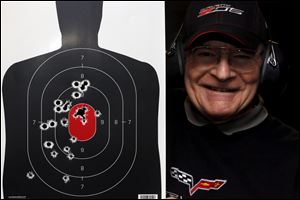 Jim Weber, of Sylvania, holds his target after shooting in the range during Cleland's Outdoor World's 