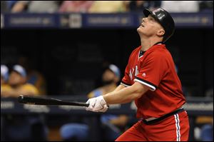 Cleveland Indians' Jay Bruce watches a pop fly during a game against the Tampa Bay Rays in 2017. The Indians were wearing throwback uniforms identical to the ones Cleveland wore when Boog Powell joined the team in 1975.