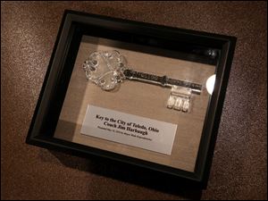 The key to the city sits on a table before being presented to Michigan's Jim Harbaugh.