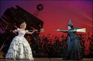 Ginna Claire Mason, left, is Glinda and & Mary Kate Morrissey is Elphaba in 'Wicked,' which is running at the Stranahan Theater through June 17.