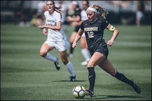 Former Perrysburg soccer player Maddy Williams shined at Purdue and is now headed overseas to begin a pro soccer career.