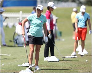 Stacy Lewis practices at the driving range ahead of the the Marathon Classic. Lewis is playing in her last tournament before taking maternity leave to have her first child.