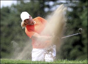 Caroline Hedwall chips out of the bunker near the 17th hole during the first round of the LPGA Marathon Classic.