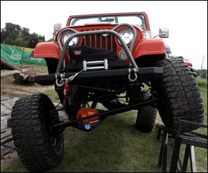 Ted Willing's 1982 Jeep Scrambler with an AMC 401 during the kickoff event of Jeep Fest at the Monroe Chrysler Dodge Jeep Ram Superstore in Monroe, Mich., on Friday.