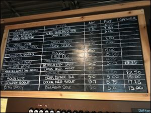 The tap room of Cotton Brewing in Adrian typically has 16 beers and ciders to choose from.