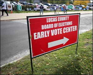 A sign points voters toward the Early Vote Center in Toledo.